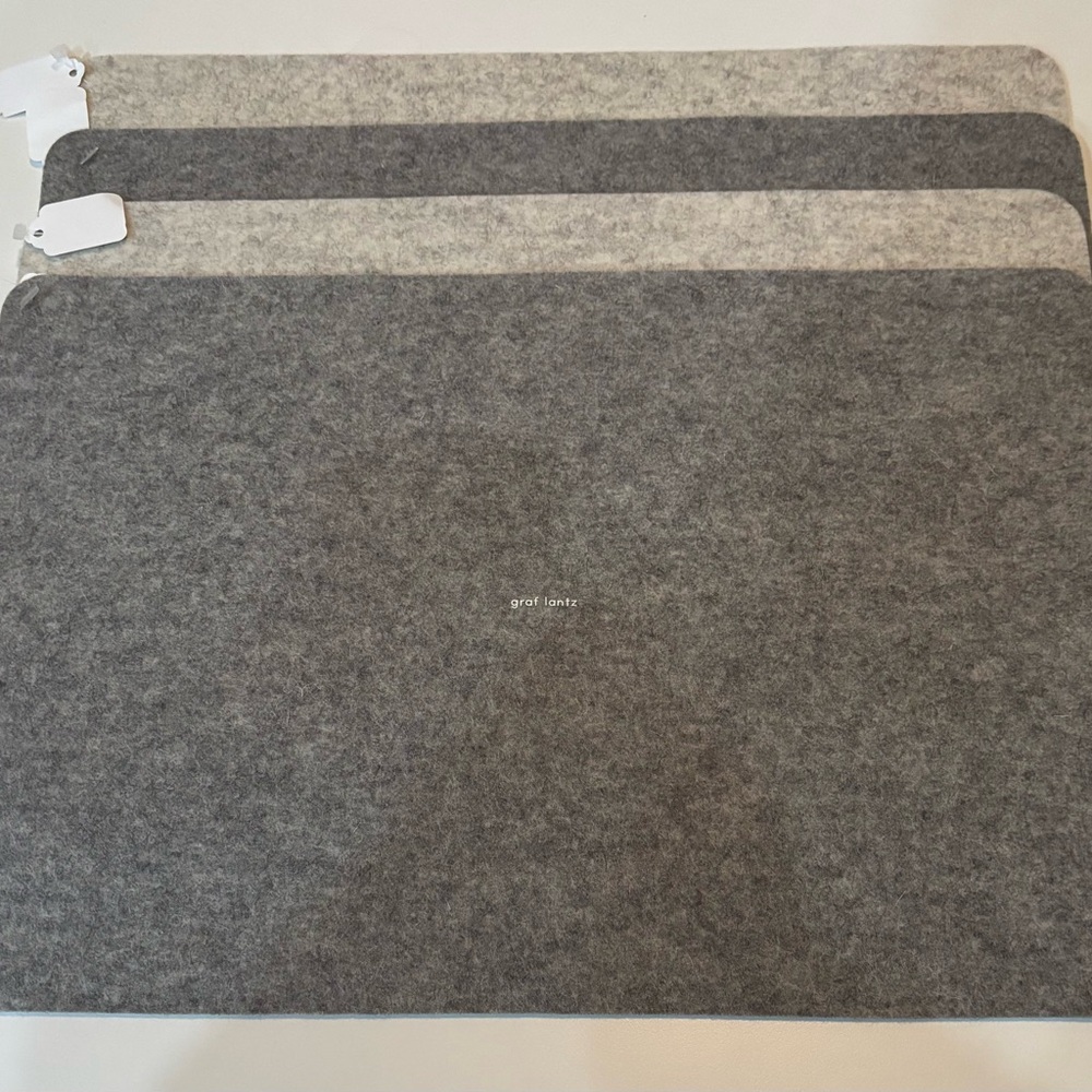 Brand New 4 Graf Lantz Merino Wool rectangular Placemats. Retail Value $168!
